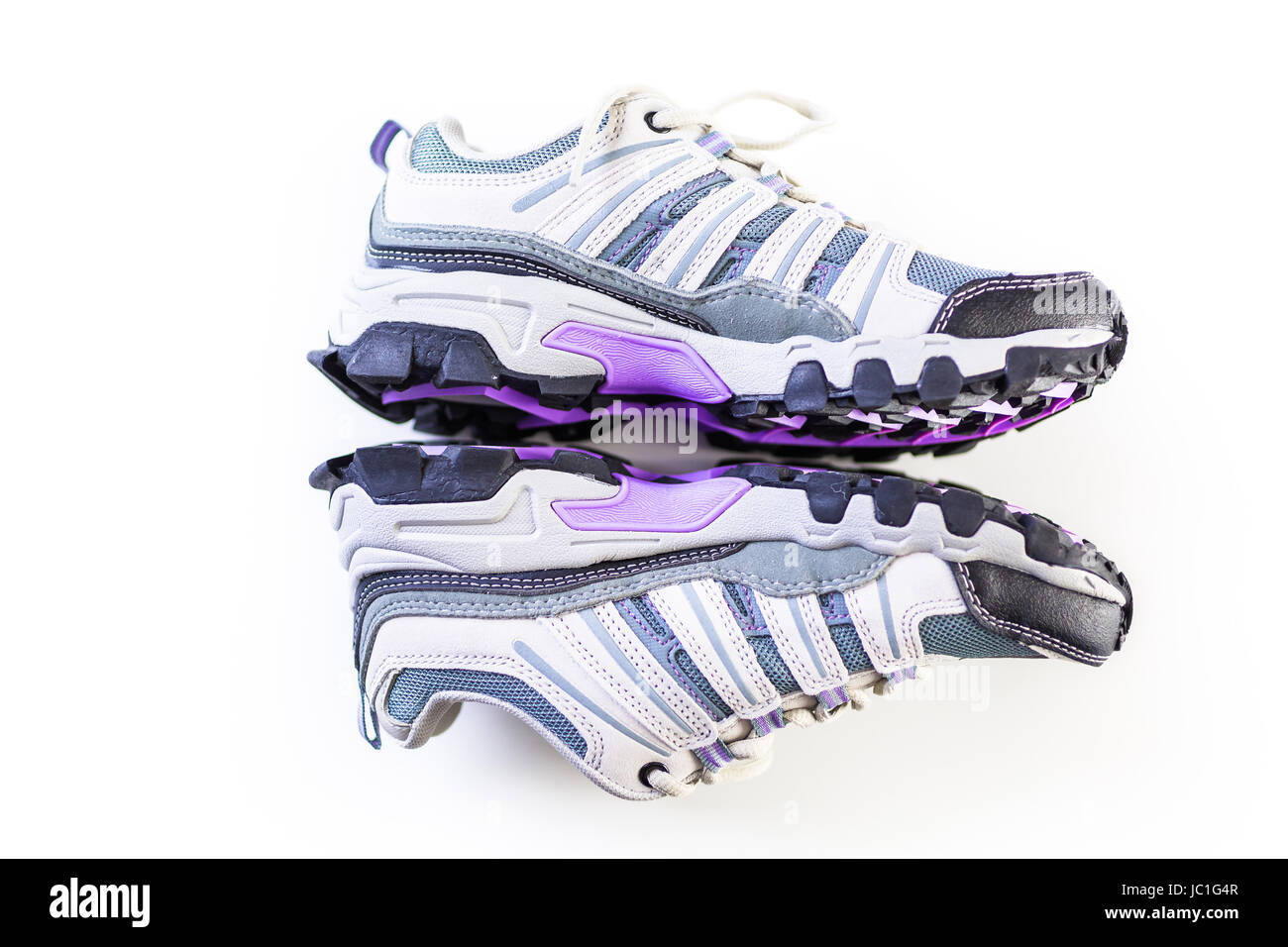 Pair of new womens hiking shoes on a white background Stock Photo - Alamy