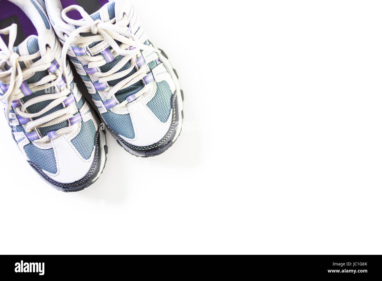 Pair of new womens hiking shoes on a white background Stock Photo - Alamy