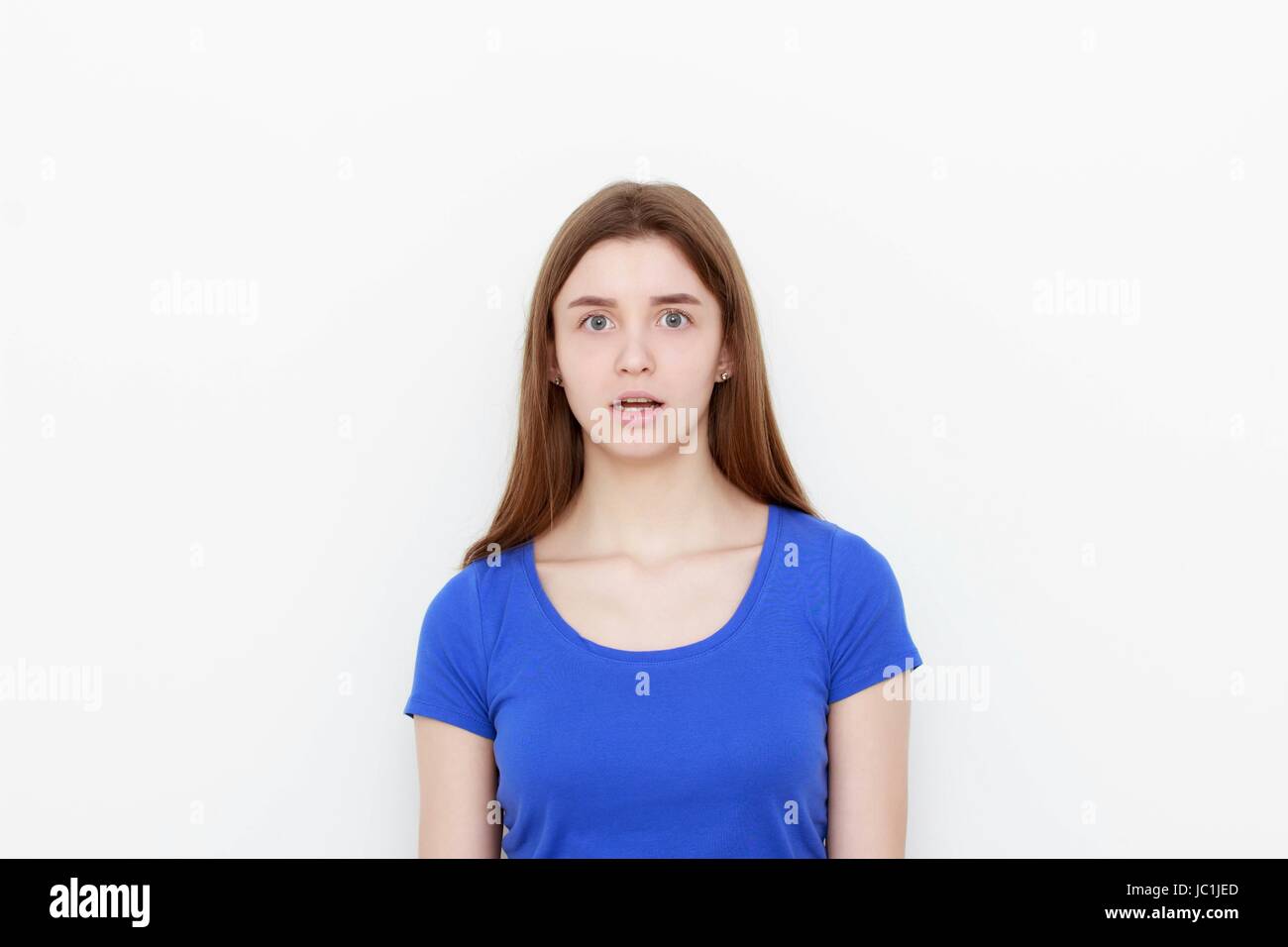 Surprised beautiful woman. Isolated on white background Stock Photo - Alamy