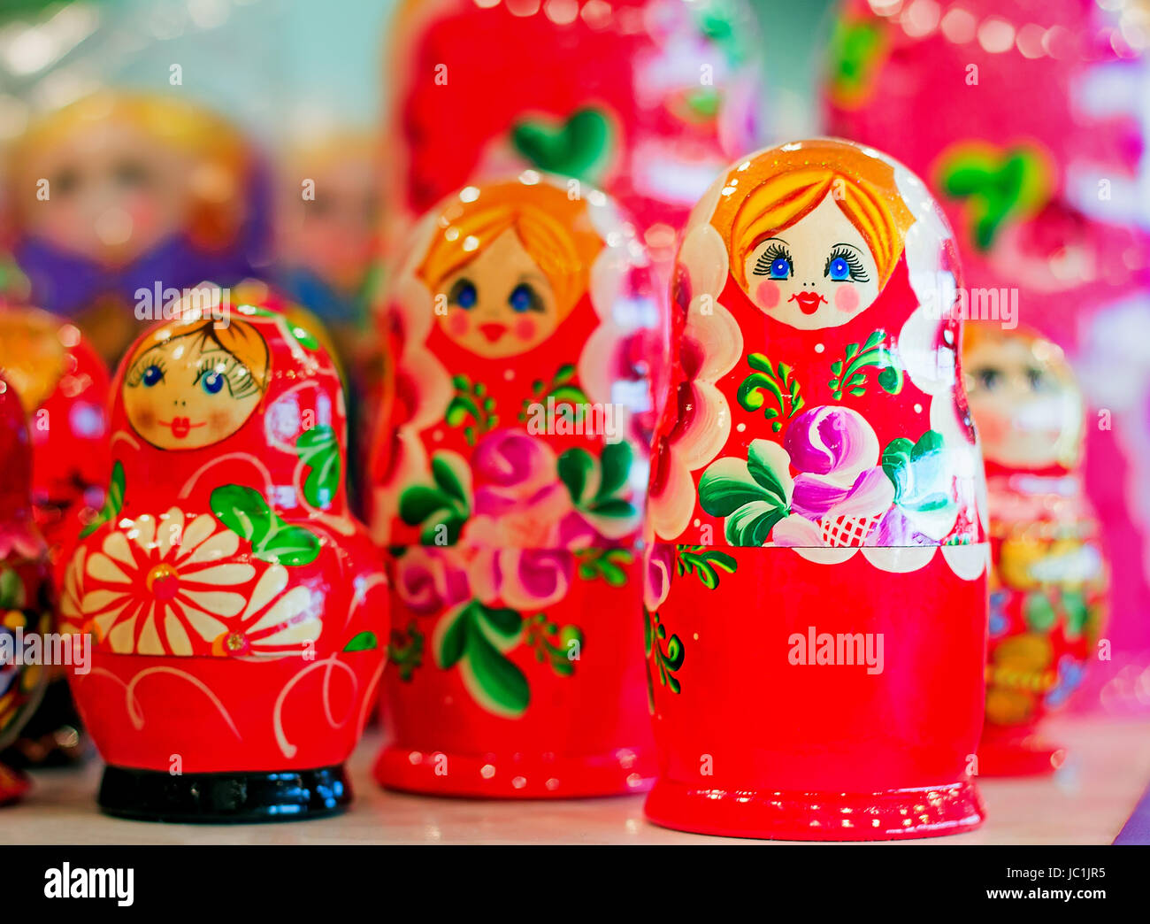 Made of a tree and beautifully painted dolls - the nested dolls, traditional Russian toys for children. Stock Photo