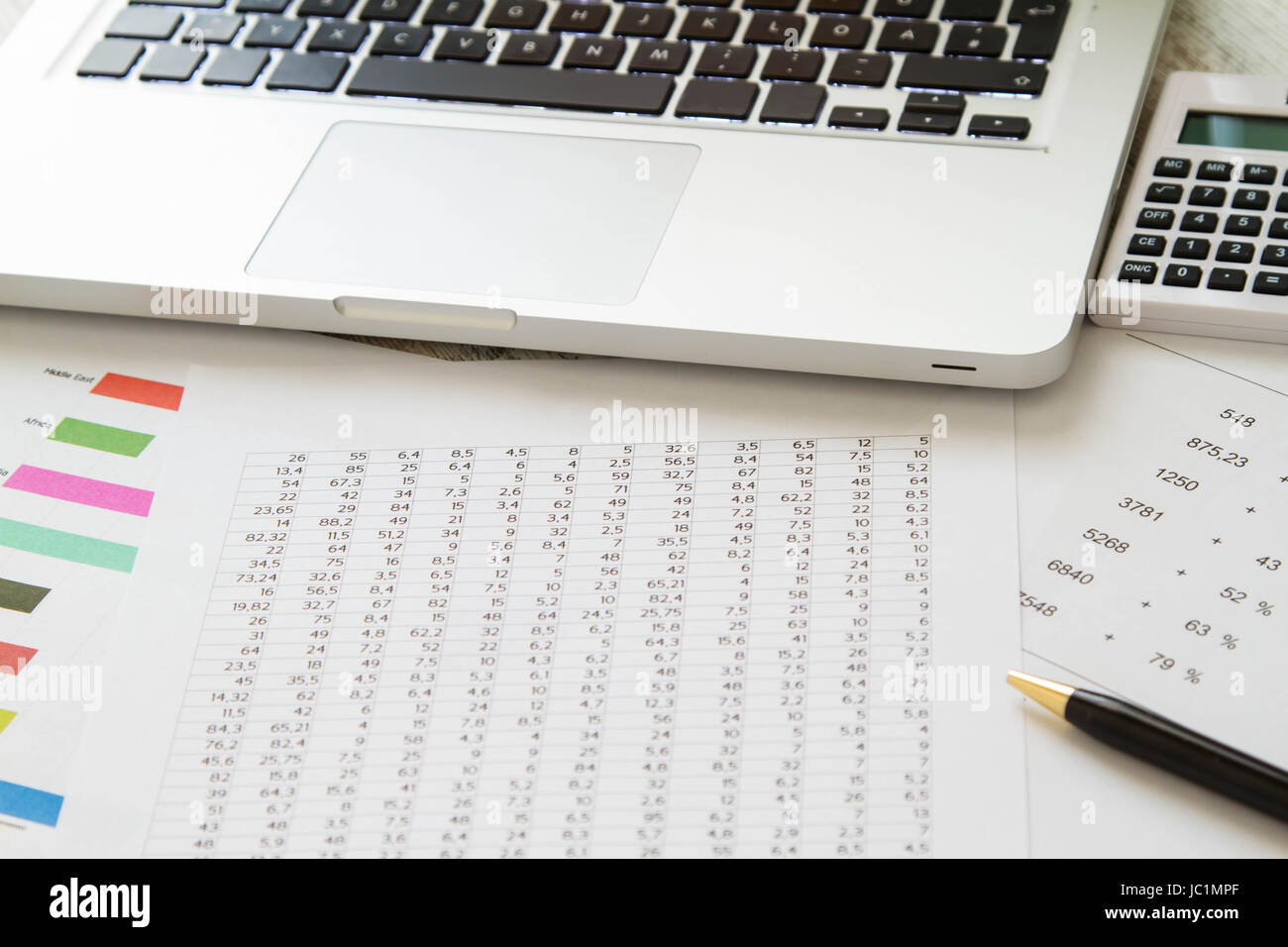 Working, analyzing and doing calculations Stock Photo - Alamy
