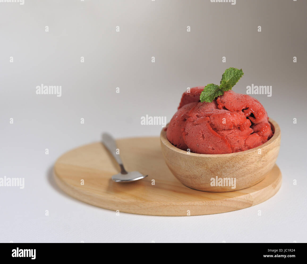 Homemade Organic Strawberry fruit ice cream in bowl Stock Photo