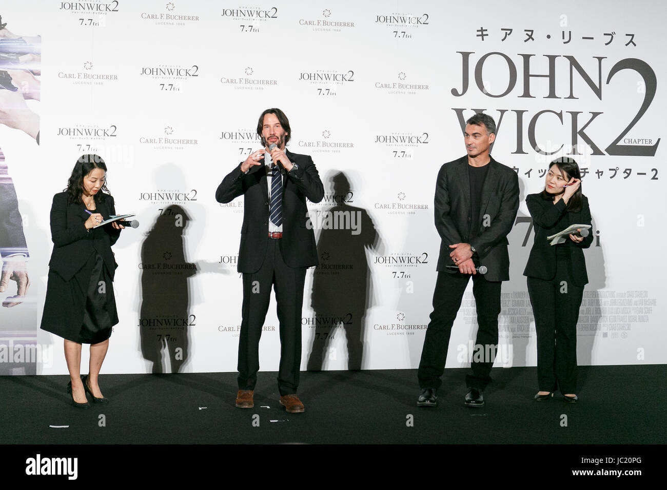 Tokyo, Japan. 13th Jun, 2017. (L to R) Actor Keanu Reeves and director Chad Stahelski speak during a premiere for his movie John Wick: Chapter 2, on June 13, 2017, Tokyo, Japan. Reeves and Stahelski came to Japan to promote ''John Wick: Chapter 2, '' a much awaited sequel to their 2014 hit ''John Wick, '' which hits Japanese theaters on July 7. Credit: Rodrigo Reyes Marin/AFLO/Alamy Live News Stock Photo