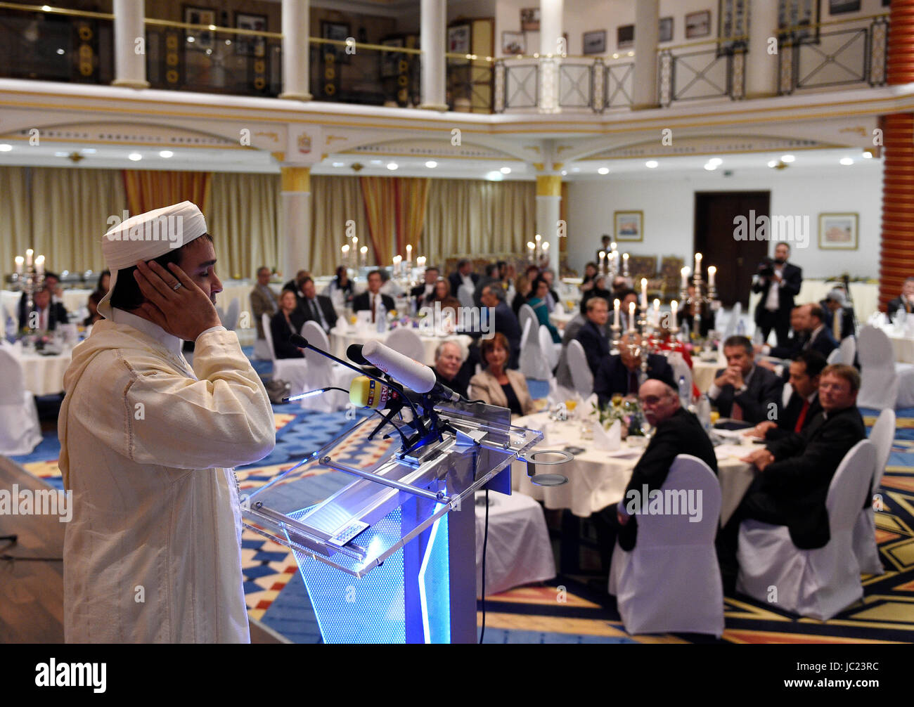 Imam Benjamin Idris speaks before Iftar - the communal breaking of the fast - in the UAE's Embassy in Berlin, Germany, 13 June 2017. Photo: Rainer Jensen/dpa Stock Photo