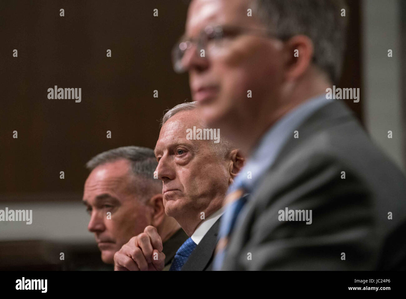 Washington DC, USA. 13th June, 2017. US Secretary of Defense James Mattis (C), Chairman of the Joint Chiefs of Staff General Joseph Dunford, Jr., (L), and Under Secretary of Defense (Comptroller) and Chief Financial Officer David Norquist (R), testify during a US House Armed Services Committee hearing on the Fiscal Year 2018 budget on Capitol Hill in Washington. Credit: Ken Cedeno/ZUMA Wire/Alamy Live News Stock Photo