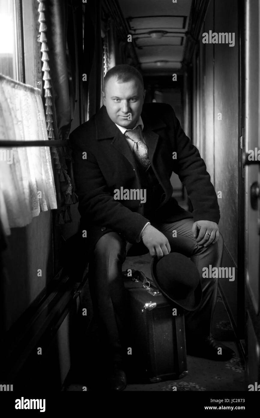 Old man sitting chair Black and White Stock Photos & Images - Alamy