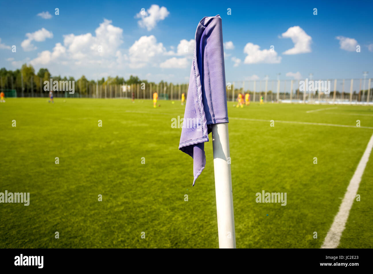 Closeup photo of blue corner flag on soccer field Stock Photo Alamy