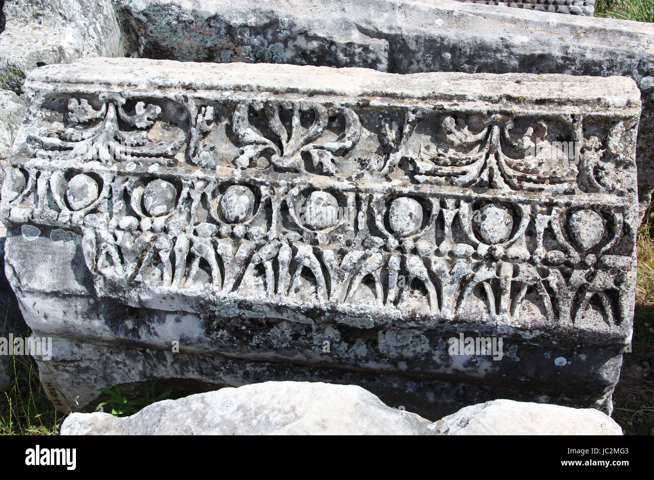 Ancient ruins in Hierapolis, Pamukkale, Turkey. UNESCO World Heritage, Stone carved relief freeze, macro background Stock Photo