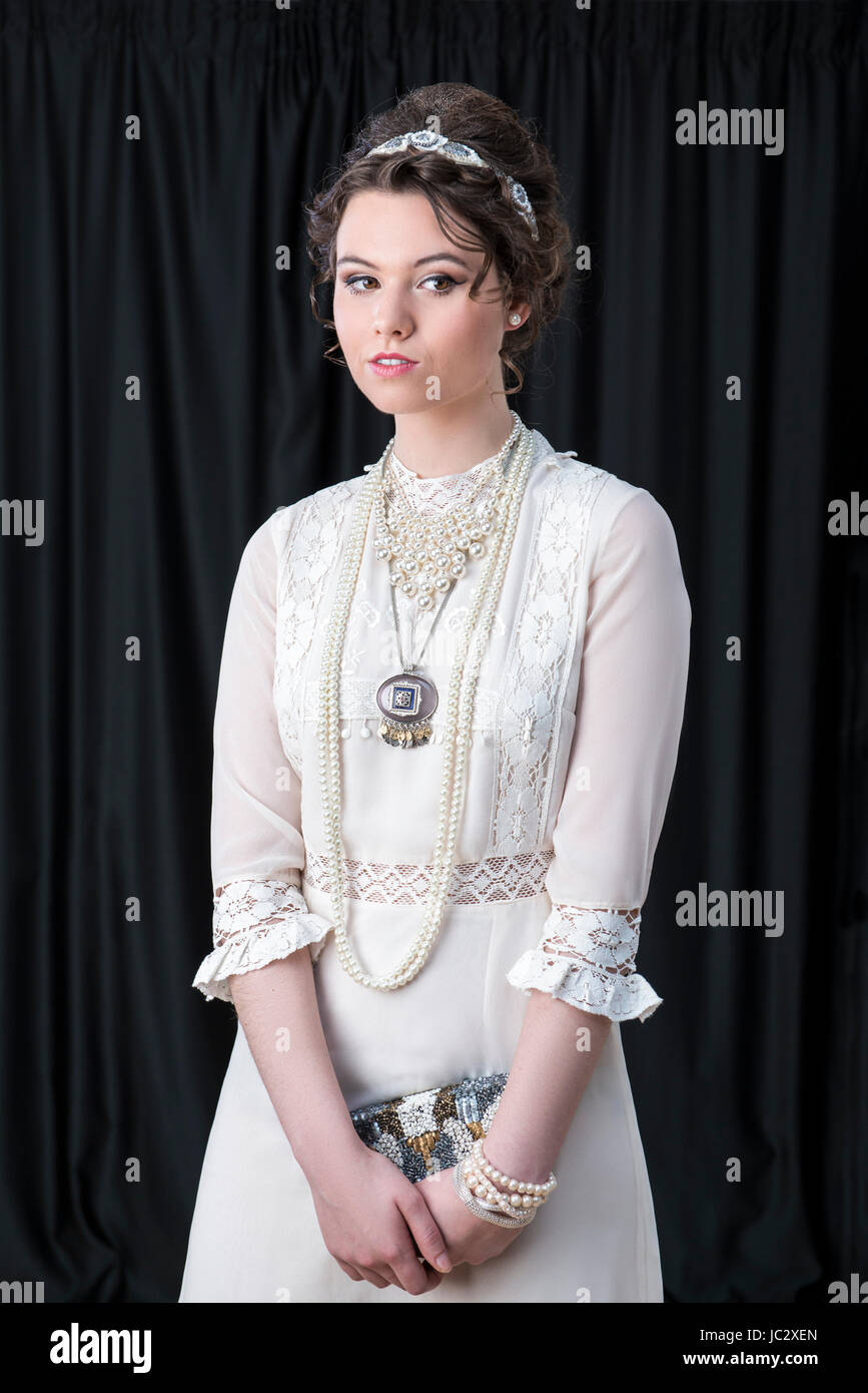Neo-Victorian model in white dress Stock Photo