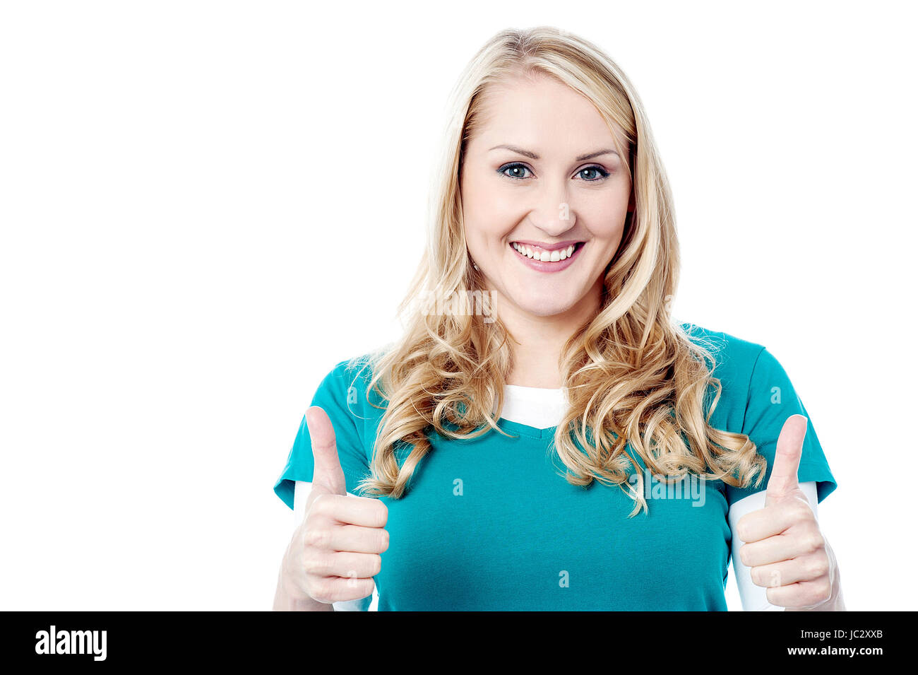 young woman showing double thumbs up Stock Photo Alamy