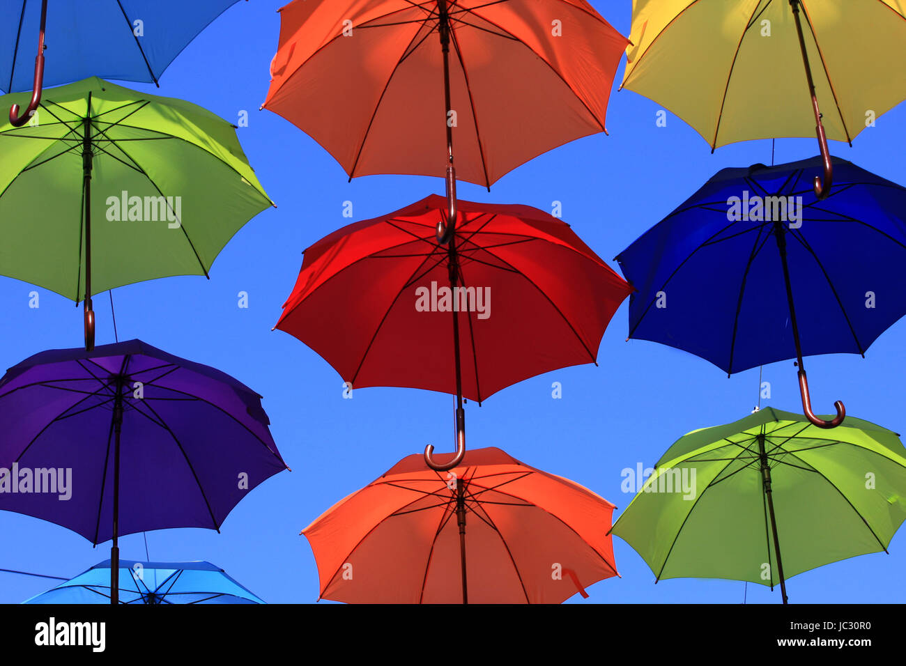 The colorful heart-shaped balloons with blue sky background Stock Photo ...