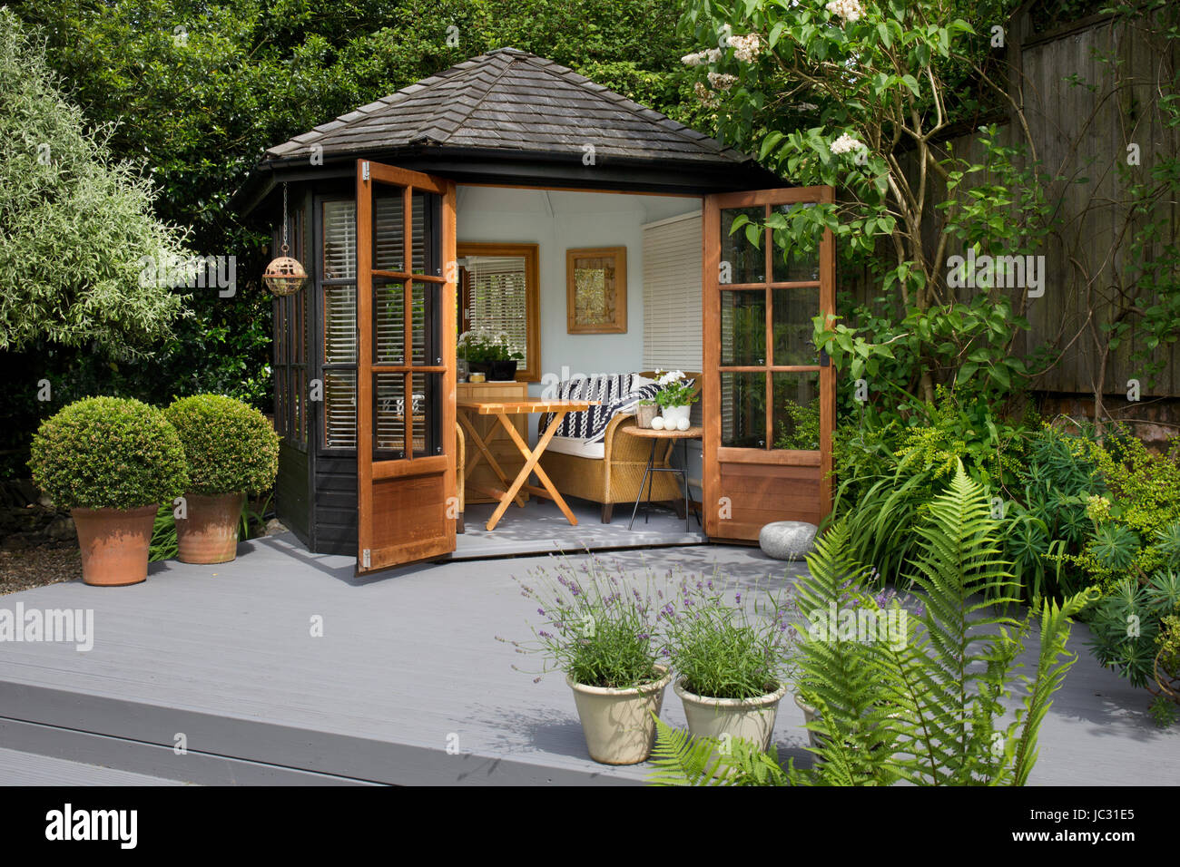 summerhouse in english garden Stock Photo Alamy