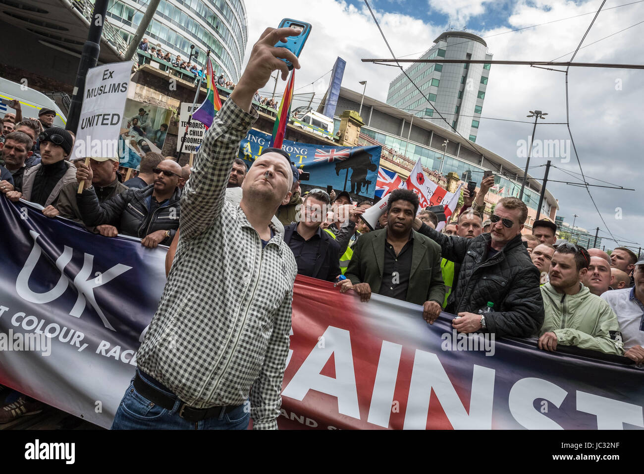 About 1,000 attend right-wing ‘Unite Against Hate' anti-Islamic march and rally lead by Tommy Robinson in Manchester city centre, UK. Stock Photo