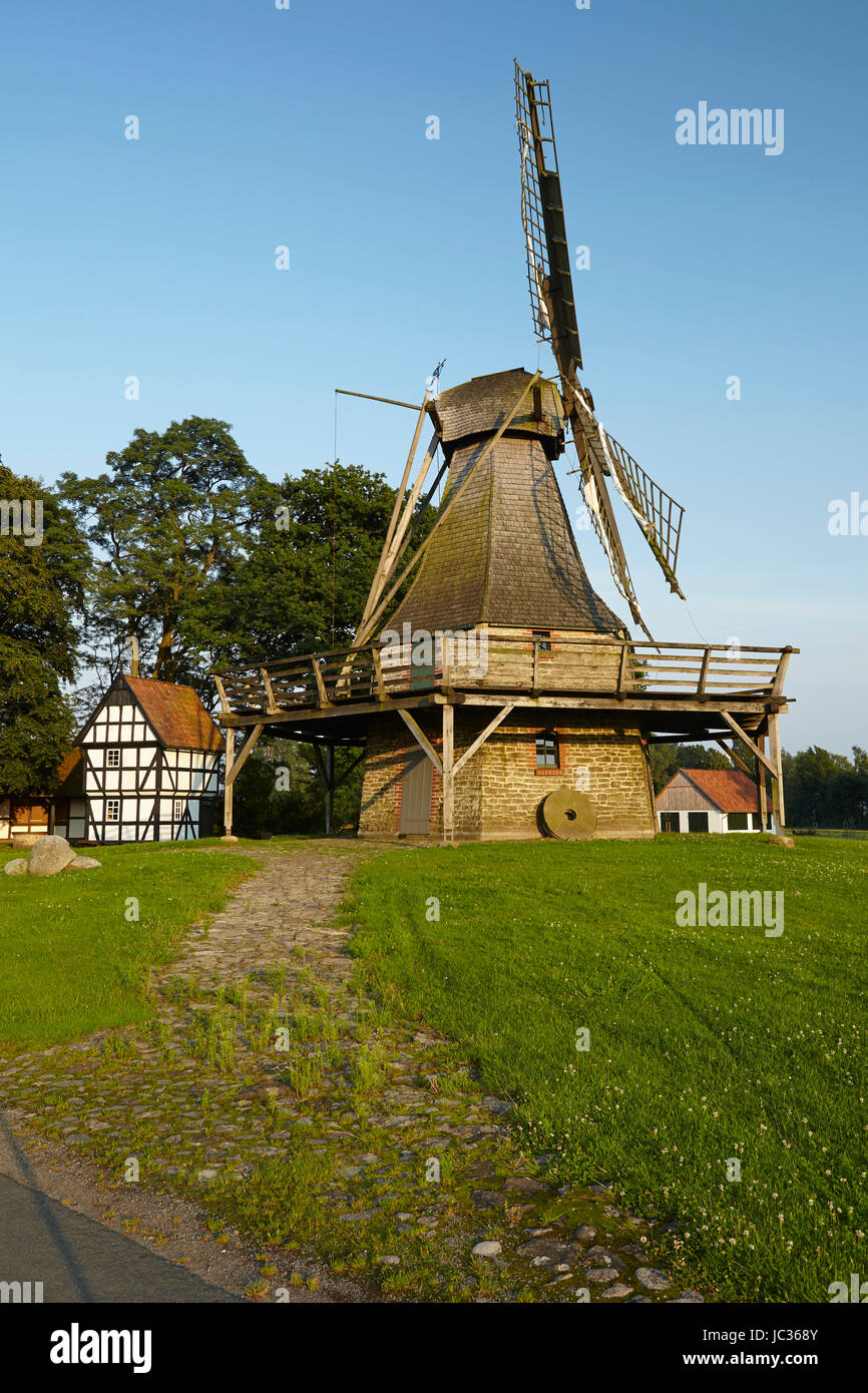 The windmill Levern (Stemwede, Germany) taken just before sunset is part of the Westphalia Mill Street in the rural district Minden-Luebbecke. Stock Photo