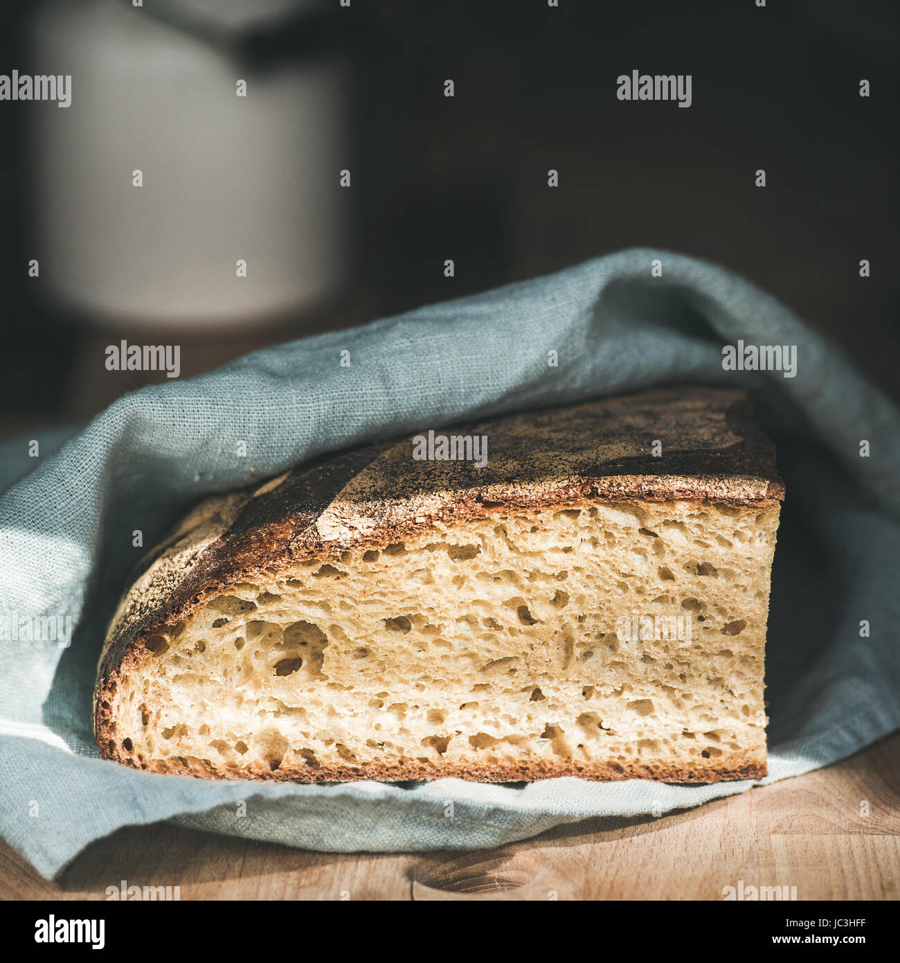Rustic French rye bread loaf on wooden board, square crop Stock Photo Alamy