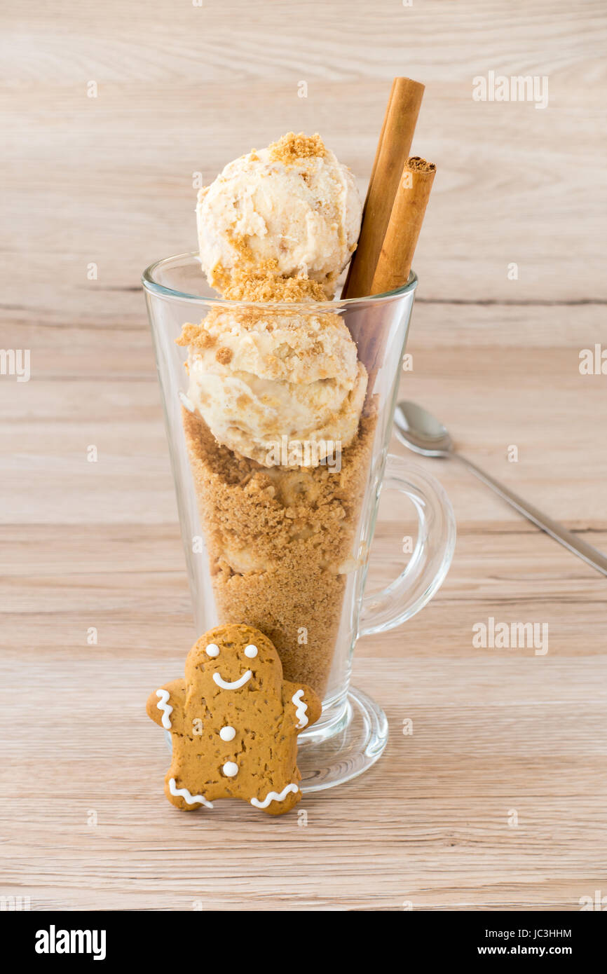 Scoops of homemade Gingerbread Ice Cream and Gingerbread crumbs in a