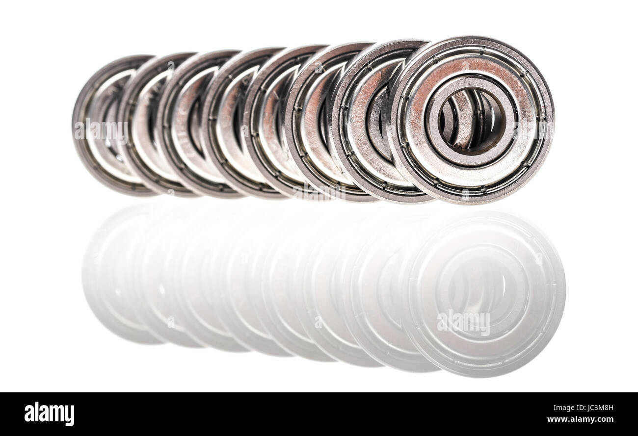 New replacement Roller Skate Bearings isolated on white background. Standard ABEC7 type bearings