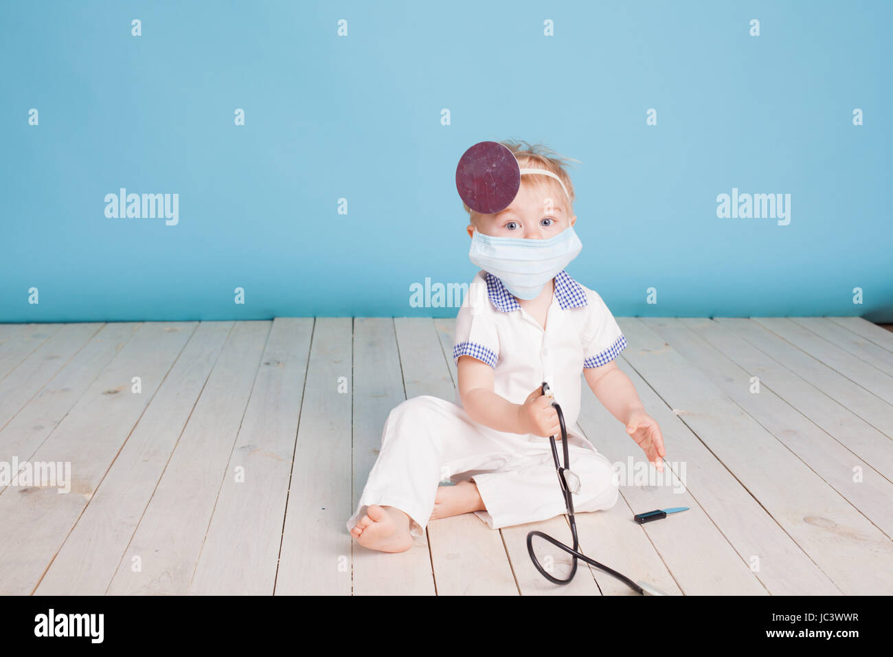 a little boy dressed as a doctor in the hospital Stock Photo