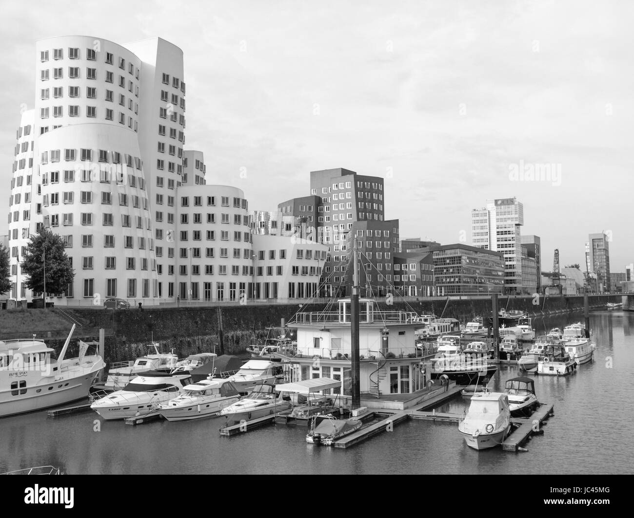 DUESSELDORF, GERMANY - AUGUST 3, 2009: The new Medienafen is a redevelopment area in the former docklands and harbour with buildings designed by Steven Holl, David Chipperfield and Frank O Gehry Stock Photo