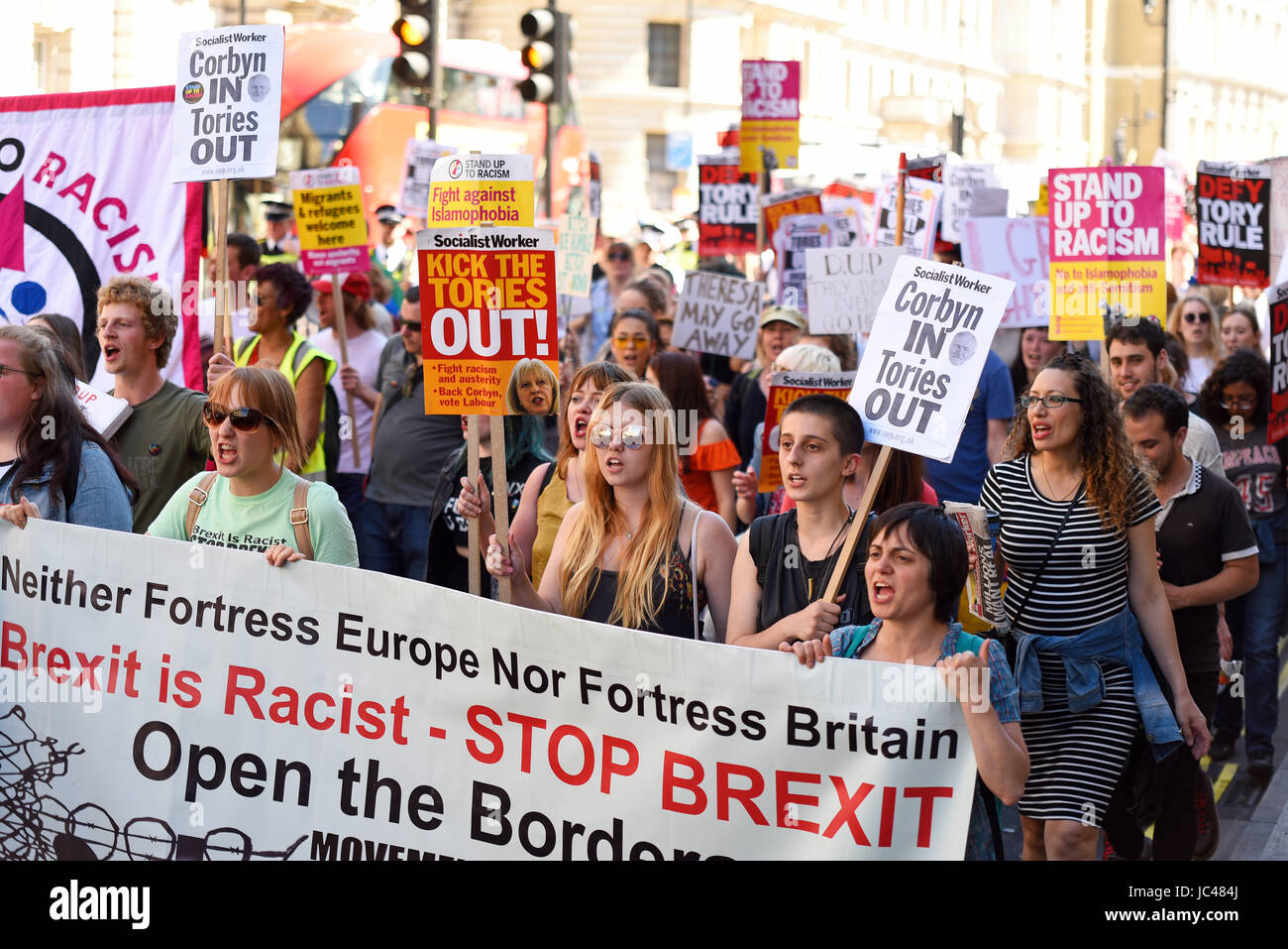 Demonstrators against the Tory DUP alliance marched on Downing Street. London. Crowd of protesters Stock Photo