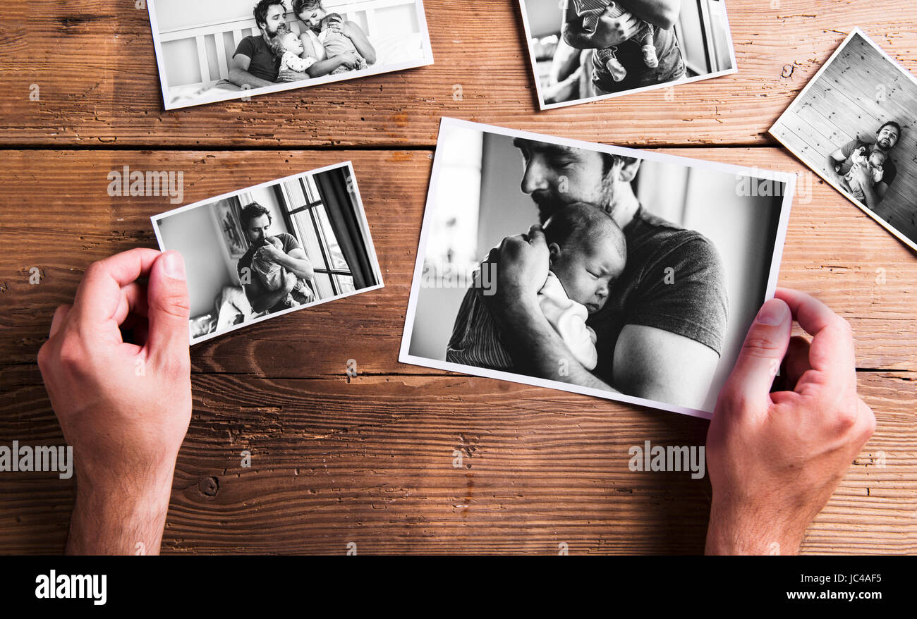 Pictures of father and daughter, wooden background. Fathers day Stock