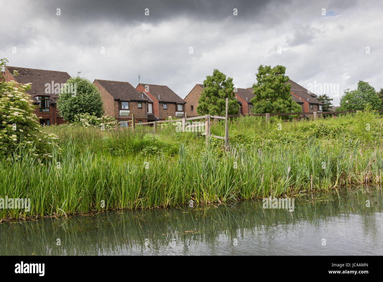 Houses on a canal side, modern development, Coseley West Midlands Black