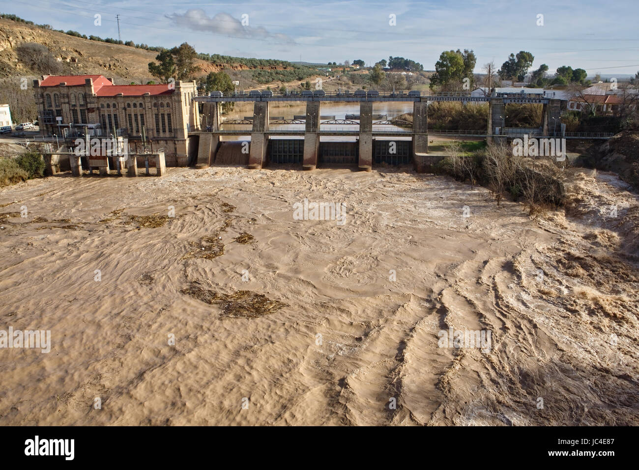 Hydroelectric power station in Mengibar releasing water after heavy rains of winter, in the province of Jaen, Spain Stock Photo