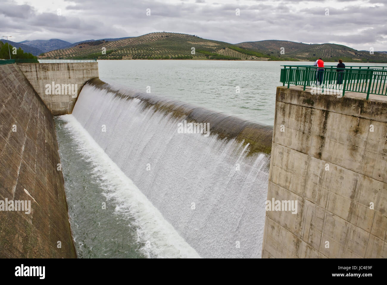 Colomera reservoir releasing water after heavy rains of winter, is situated on the river Colomera and Juntas, near the town of Colomera, in the provin Stock Photo