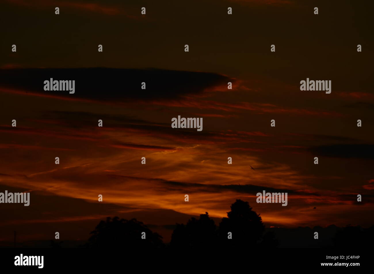Fiery orange sunset sky. Beautiful sky Stock Photo - Alamy