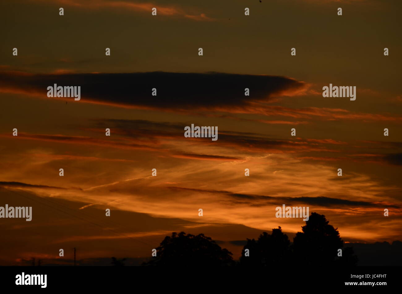 Fiery orange sunset sky. Beautiful sky Stock Photo - Alamy