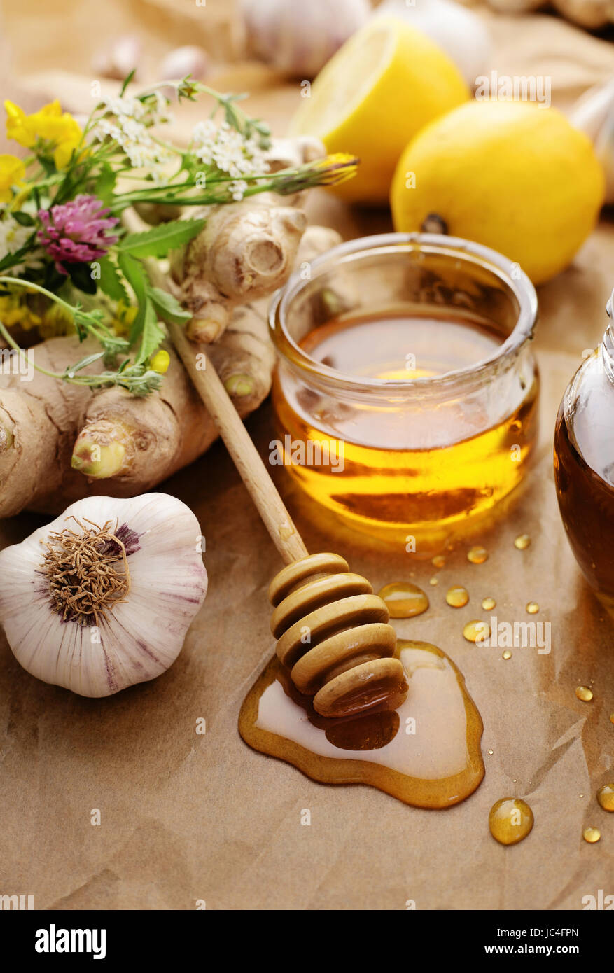 Honey, garlic, herbs, lemon and ginger natural medicine, healthy food