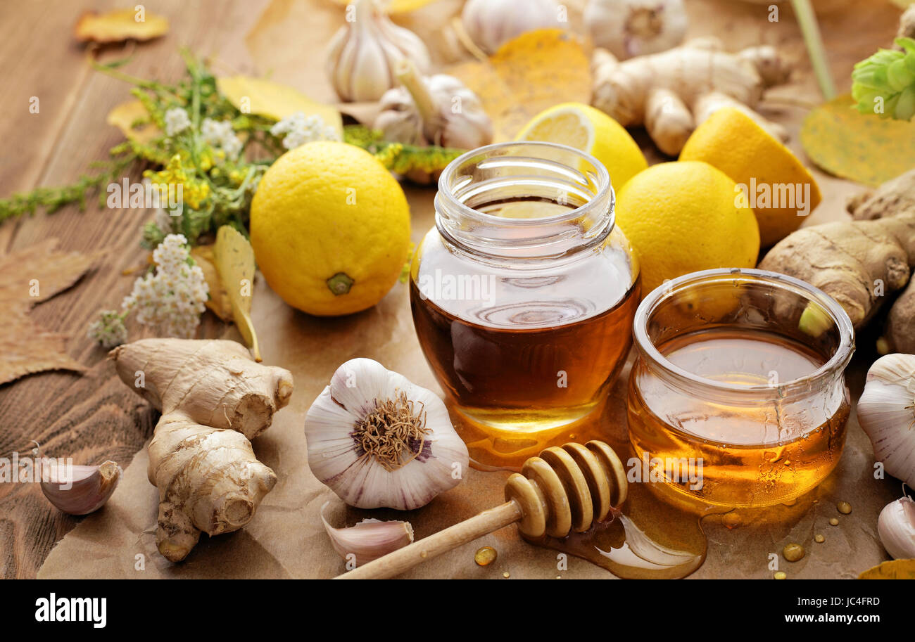 Honey, garlic, herbs, lemon and ginger natural medicine, healthy food