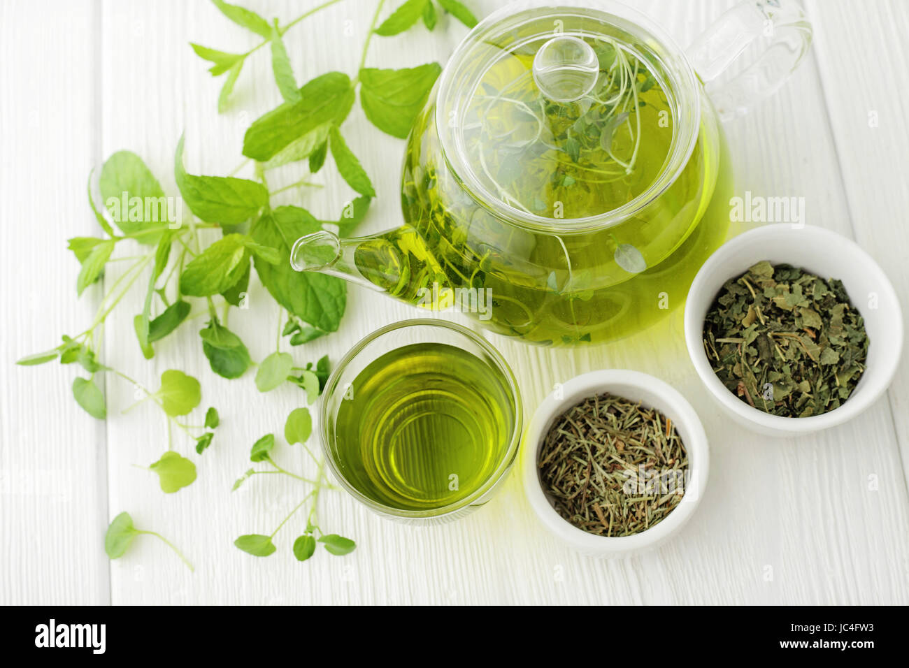 healthy green tea cup with tea leaves Stock Photo Alamy