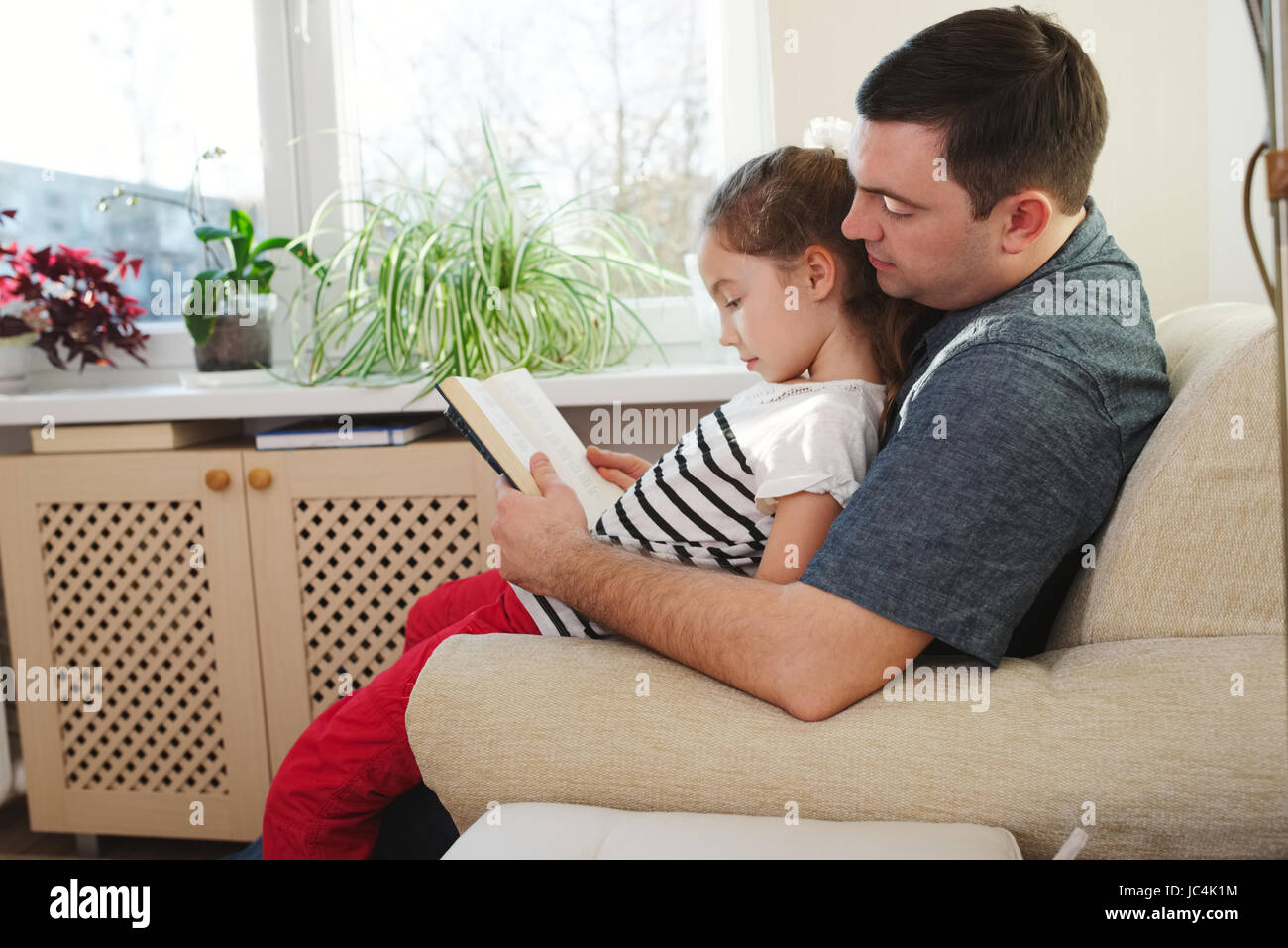 father with daughter at home Stock Photo - Alamy
