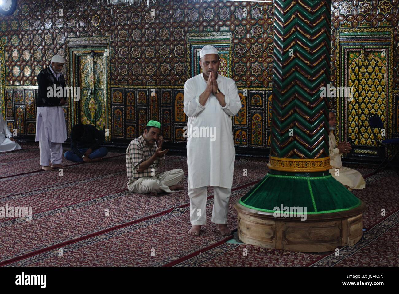 A Kashmiri Muslim man prays during the holy month of Ramadan inside a ...