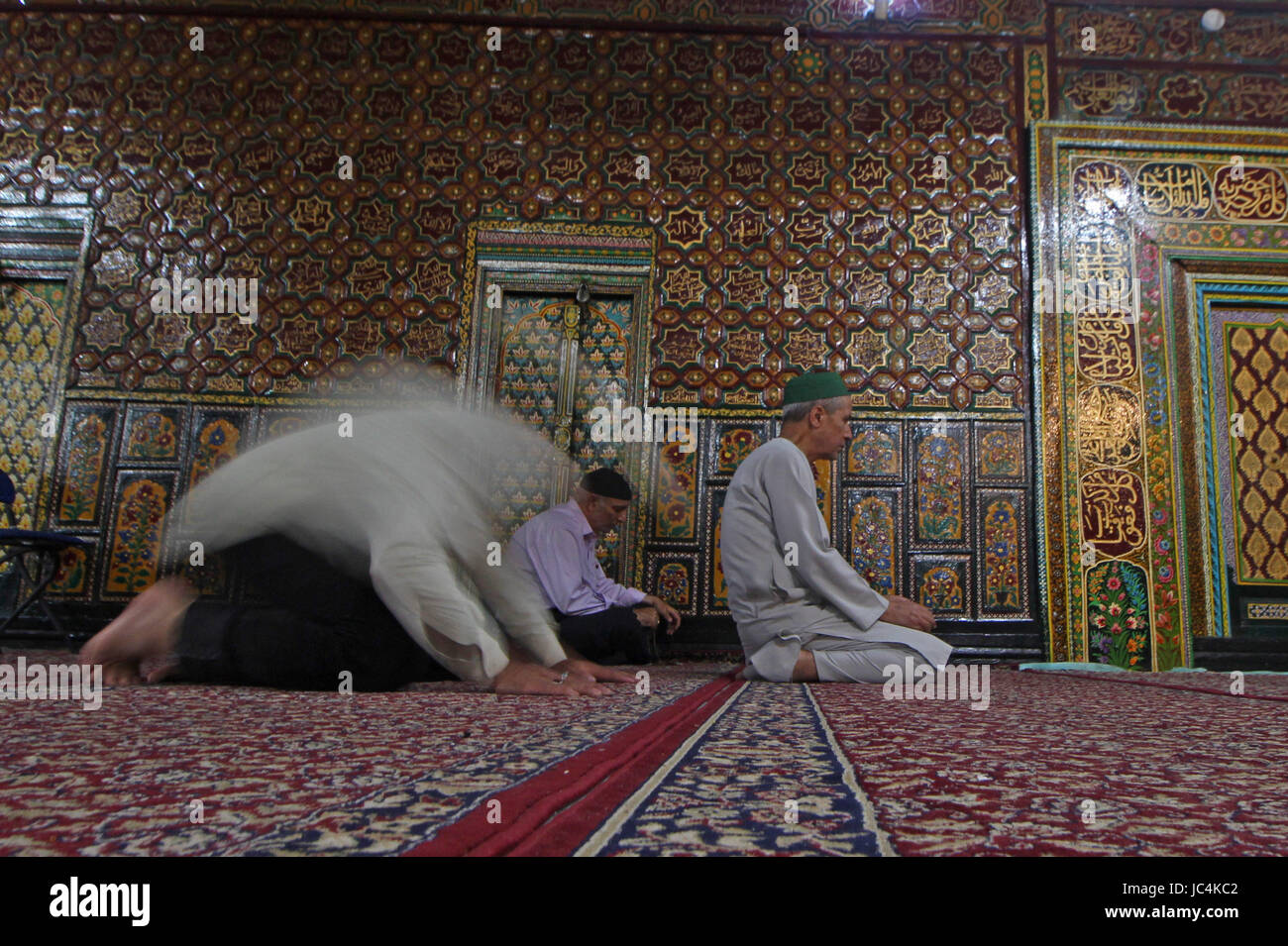 A Kashmiri Muslim man prays during the holy month of Ramadan inside a ...