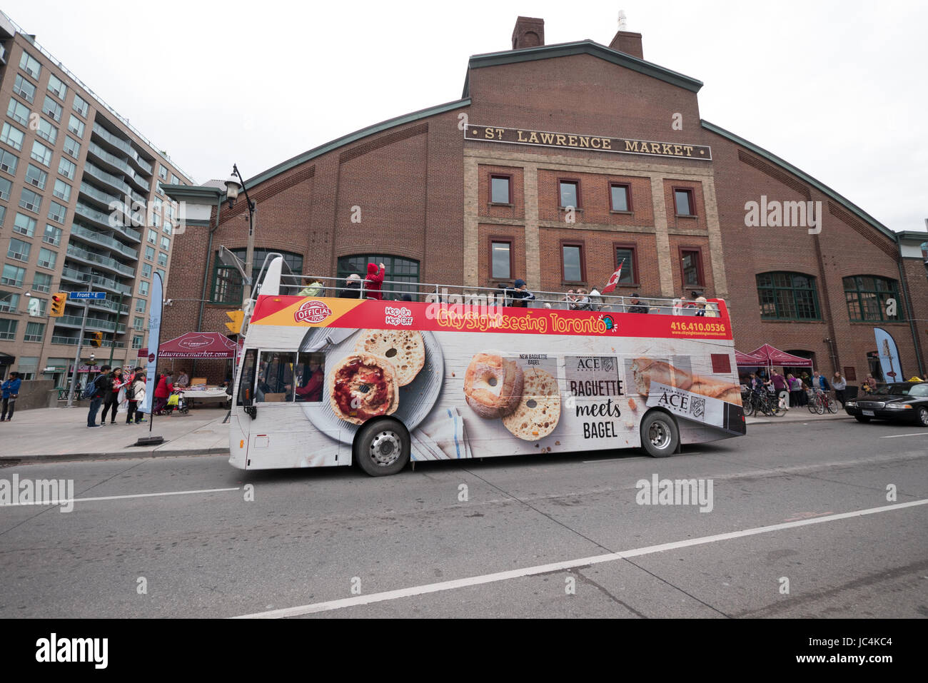 a tour bus parked by the st lawrence market in toronto canada Stock Photo