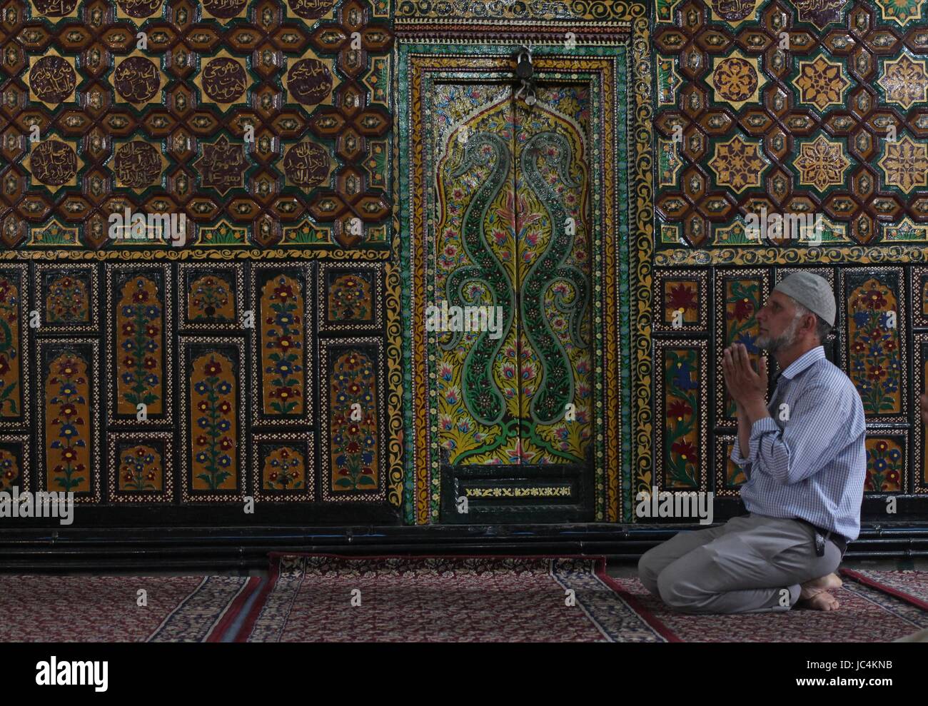 A Kashmiri Muslim man prays during the holy month of Ramadan inside a ...