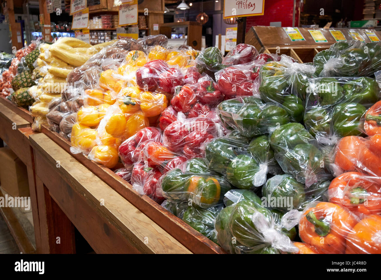 bagged peppers and fruits at reading terminal market food court Philadelphia USA Stock Photo