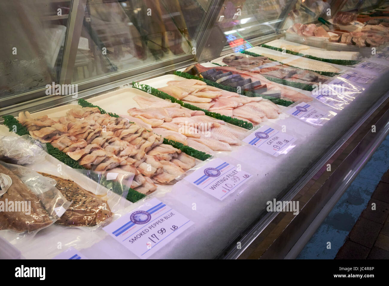 various fish fillets for sale at reading terminal market food court Philadelphia USA Stock Photo