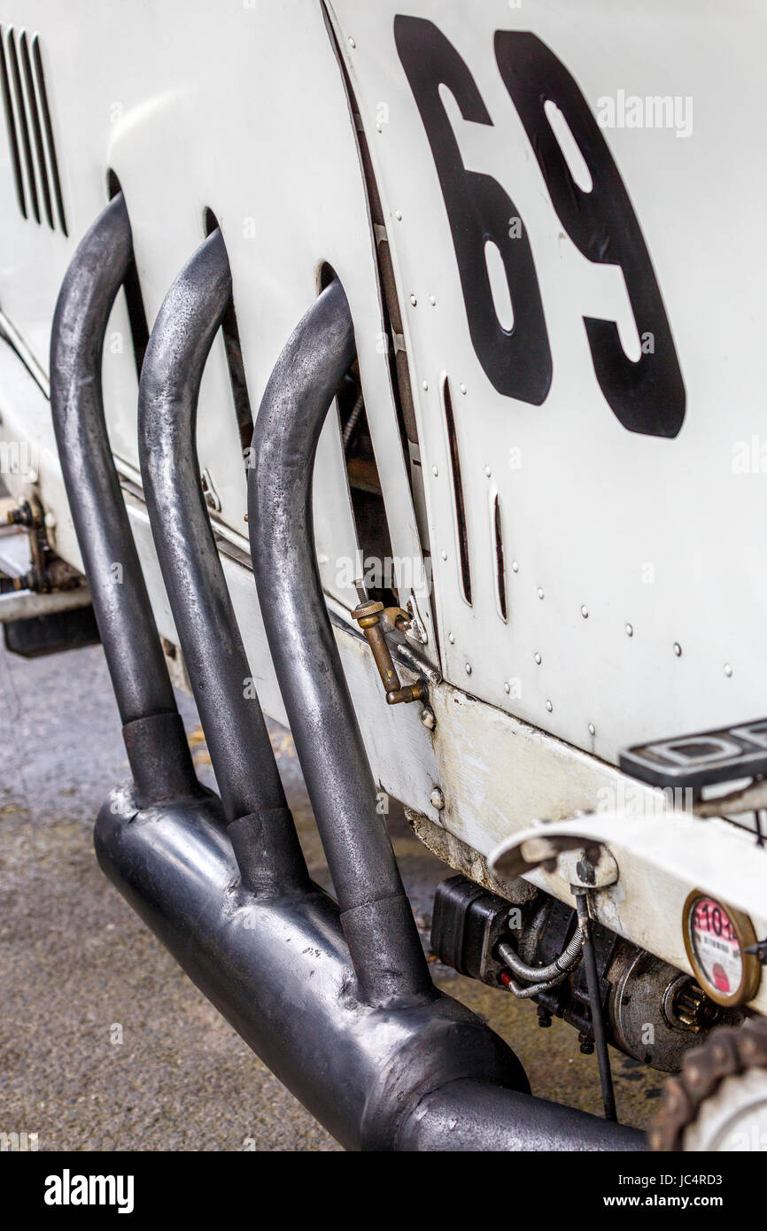 Detail of the side exhaust pies on the 1913 Daimler Mercedes Rennwagen in the paddock at Goodwood GRRC 75MM Members Meeting, Sussex, UK. Stock Photo