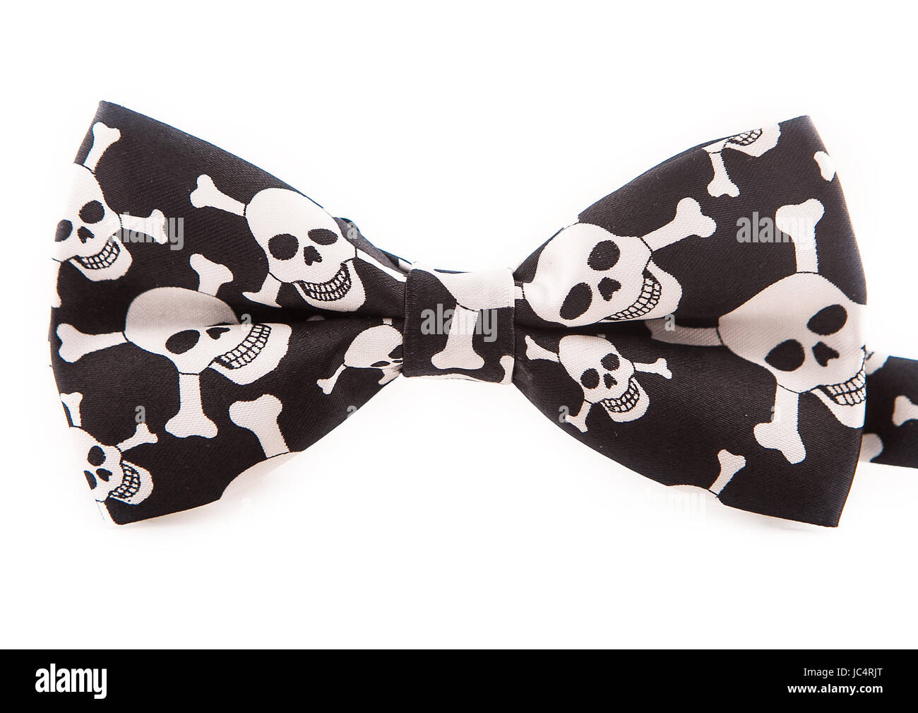 Fashionable black bow with a decor of white skulls on an isolated white background Stock Photo