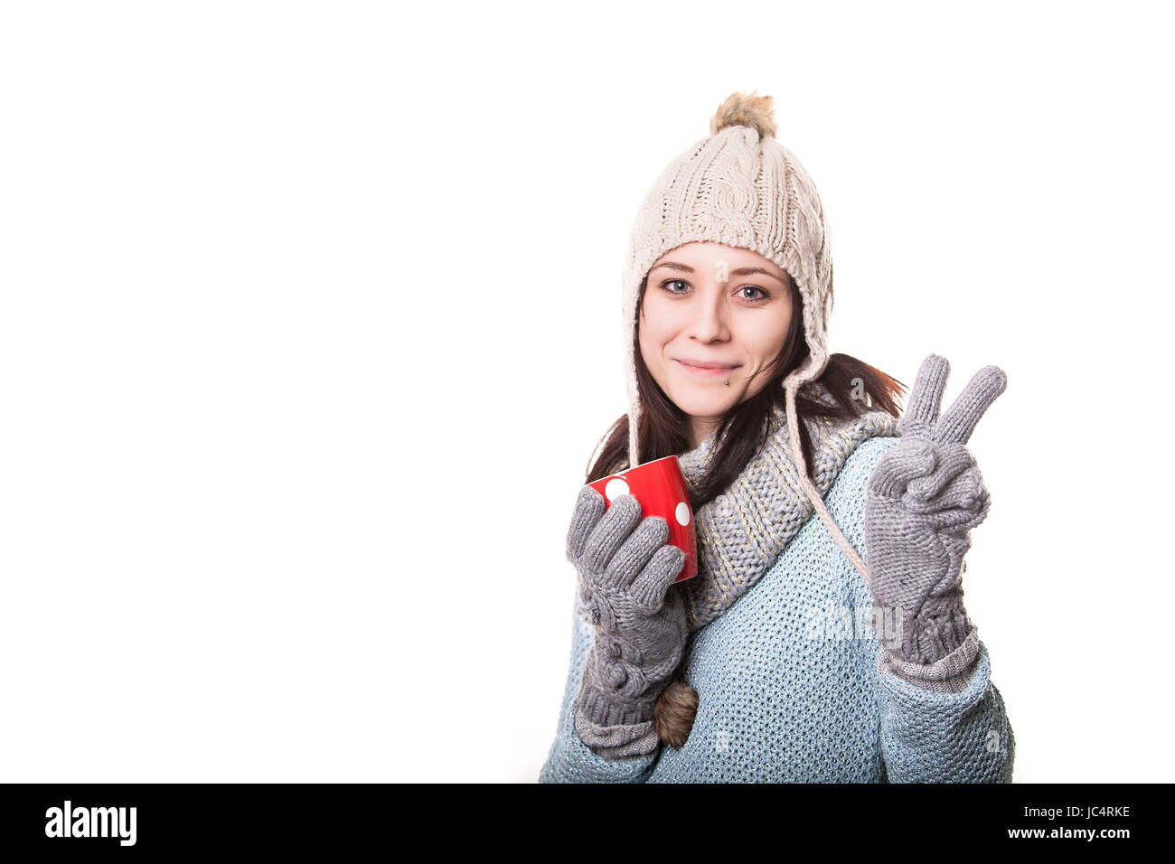 Peaceful woman relaxing at home with cup of tea Stock Photo - Alamy