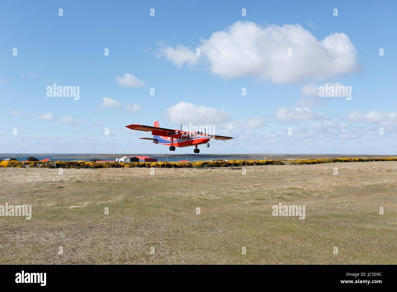 Falkland Islands Government Air Service (FIGAS) Britten-Norman Islander aircraft landing at Darwin, Goose Green, Falkland Islands Stock Photo