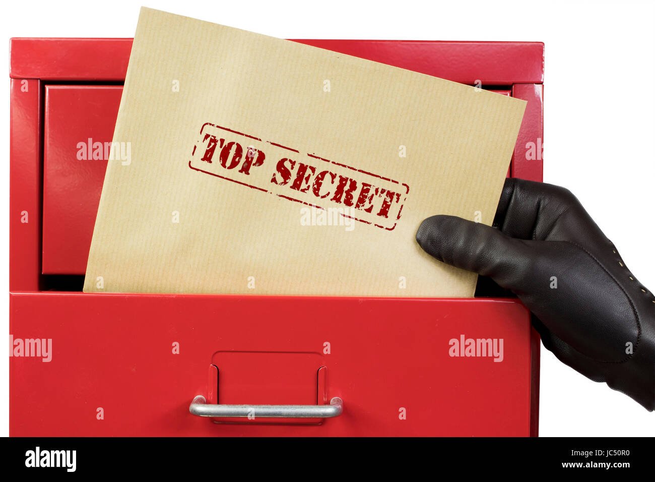 Getting top secret documents from a red file cabinet, over a white background. Stock Photo