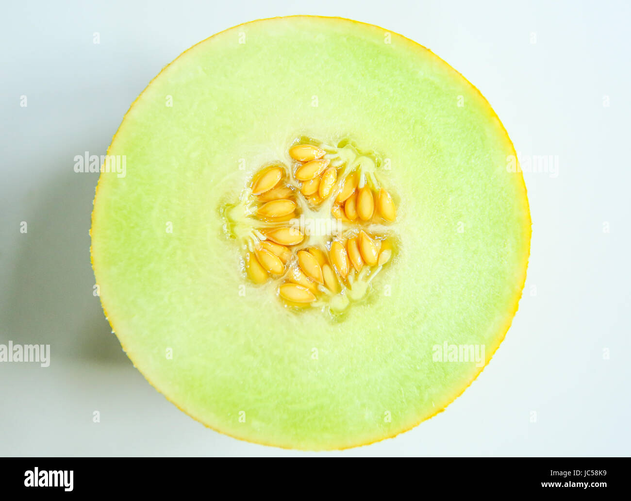 Galia melon whole fruit and cut Stock Photo Alamy