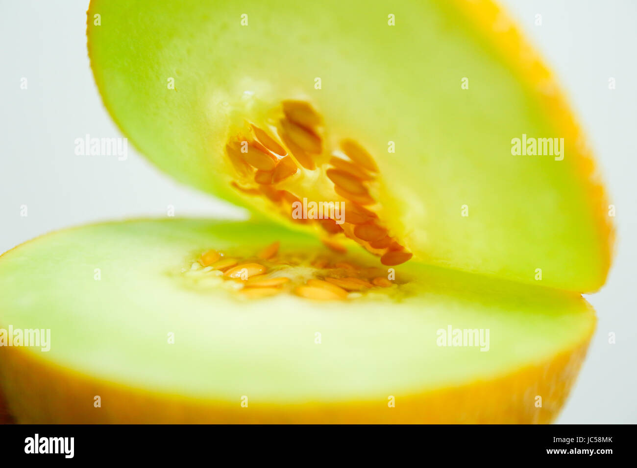 Galia melon whole fruit and cut Stock Photo Alamy