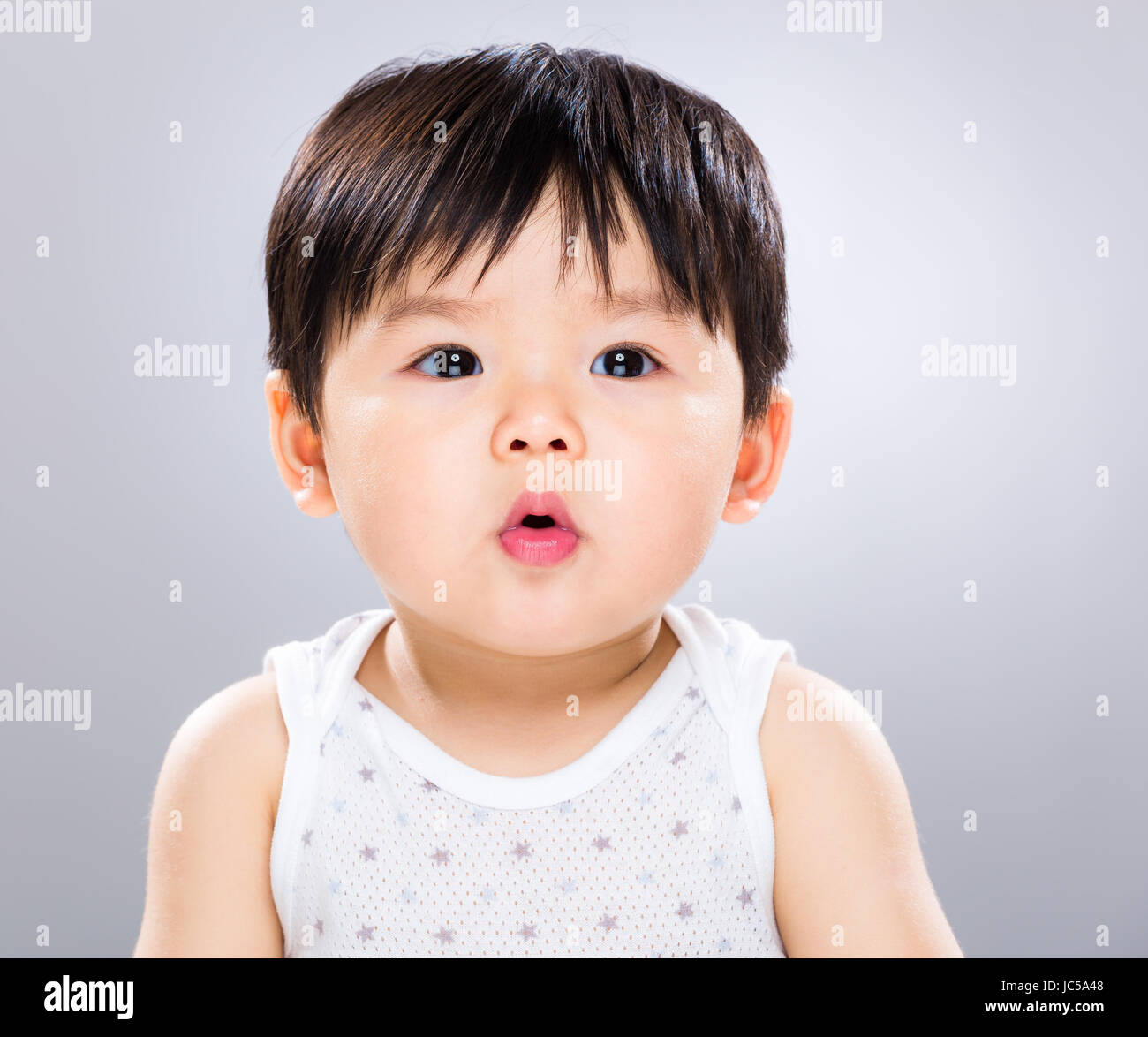 Baby boy pout lip Stock Photo - Alamy