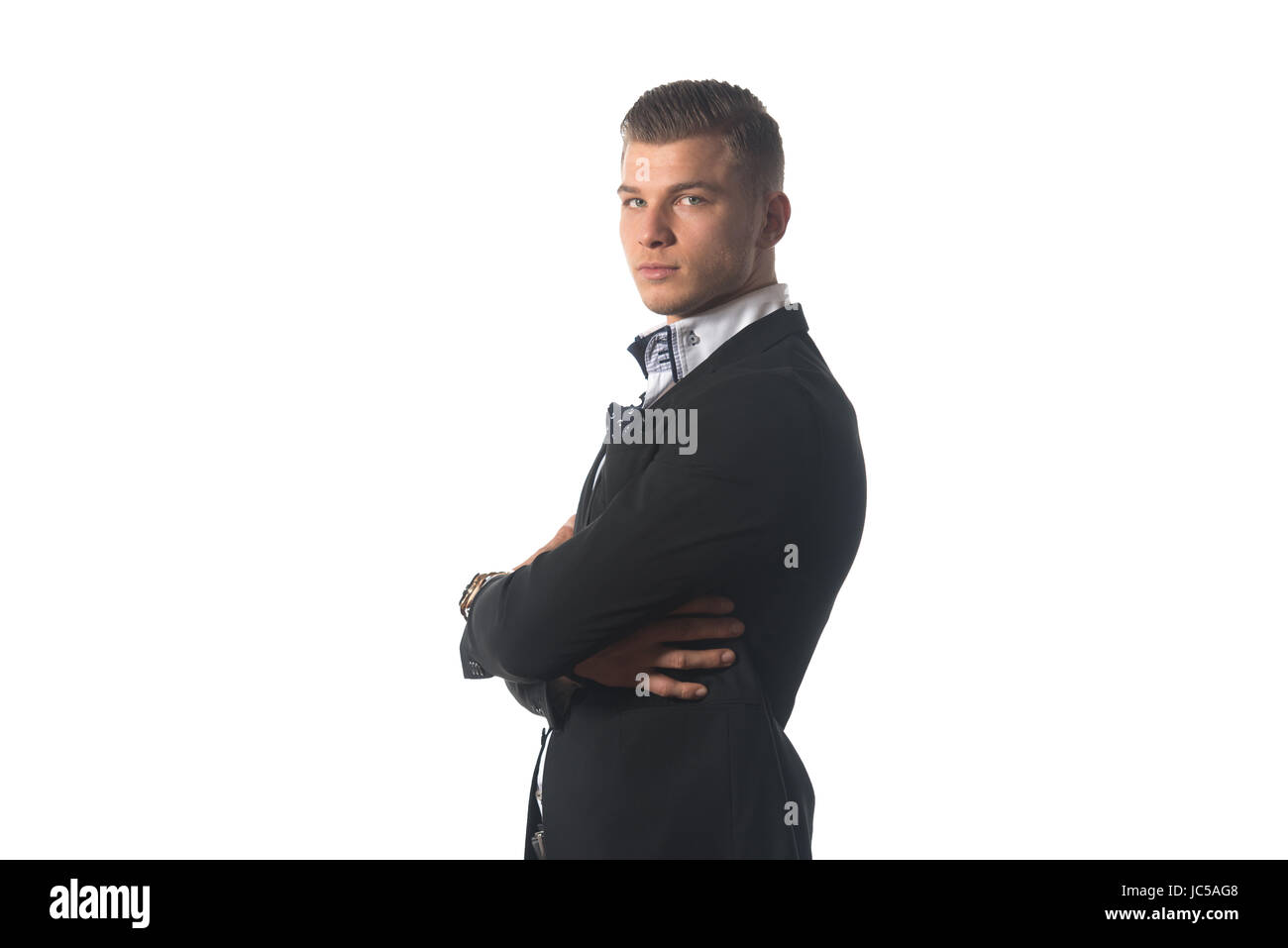 Portrait of a Young Businessman Standing Against Isolated White ...