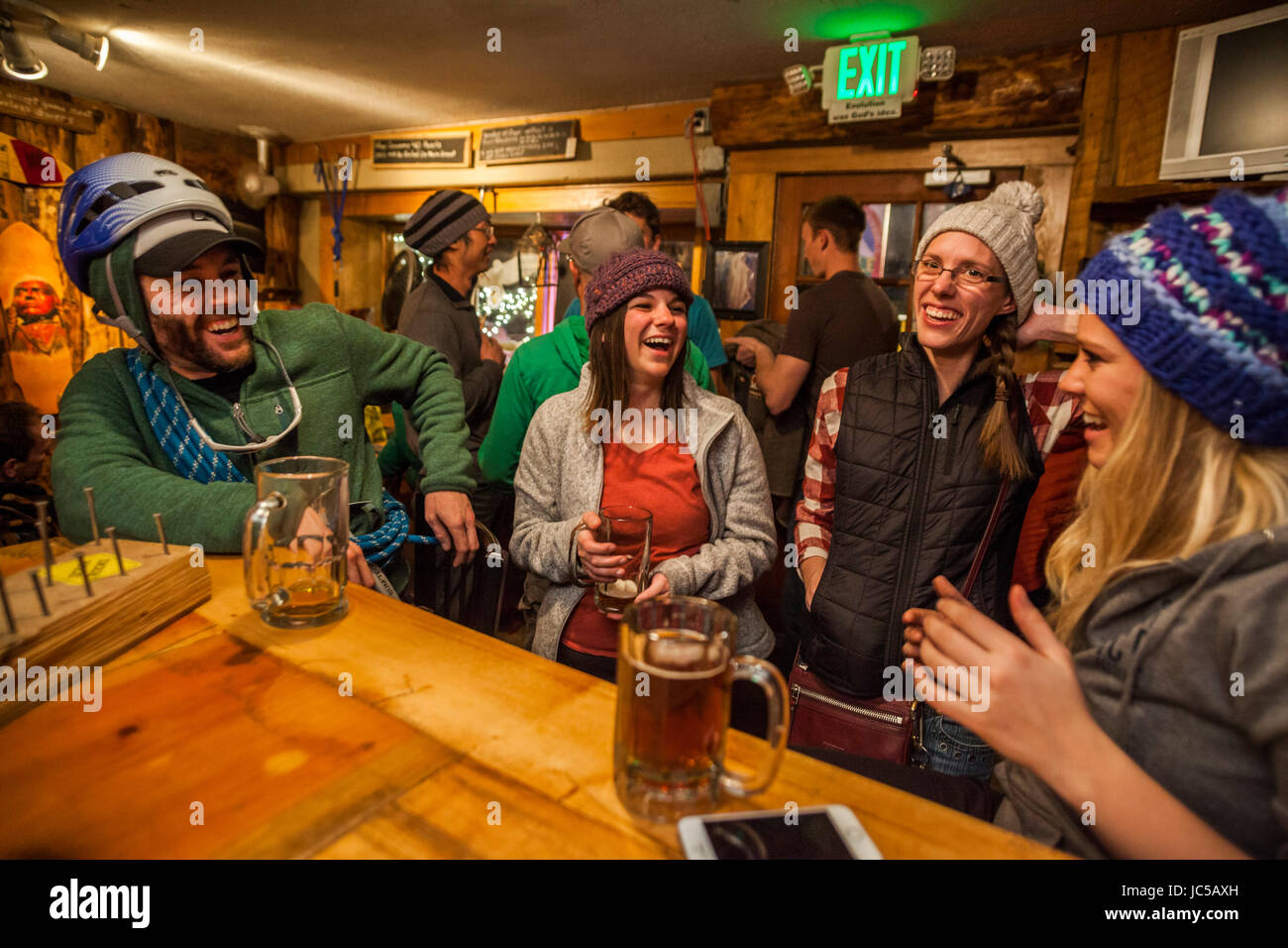 Climbers drink beer and socialize at the Ourayle House Brewery (Mr. Grumpy Pants) after a day at